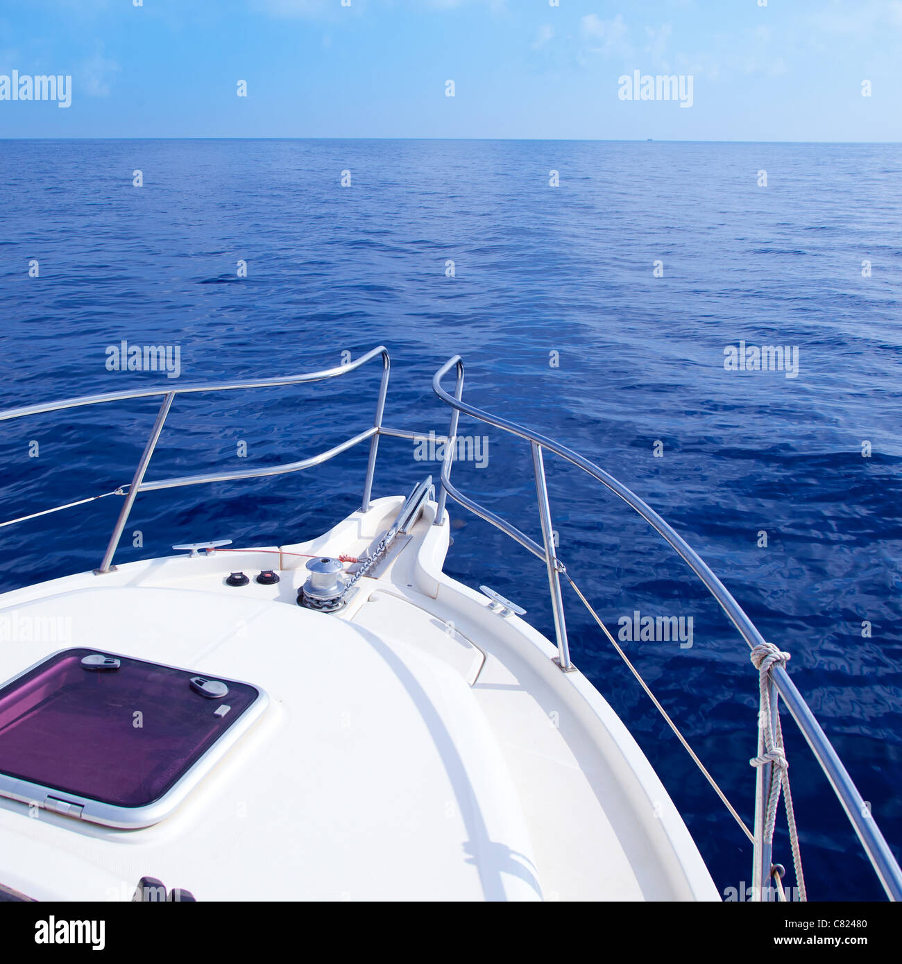 Boat bow sailing in blue Mediterranean sea in summer vacation Stock