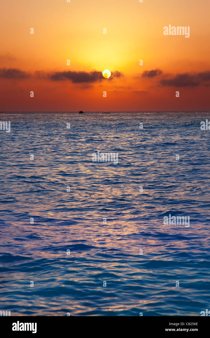 Mediterranean sea sunrise sunset with sun in orange sky Stock Photo
