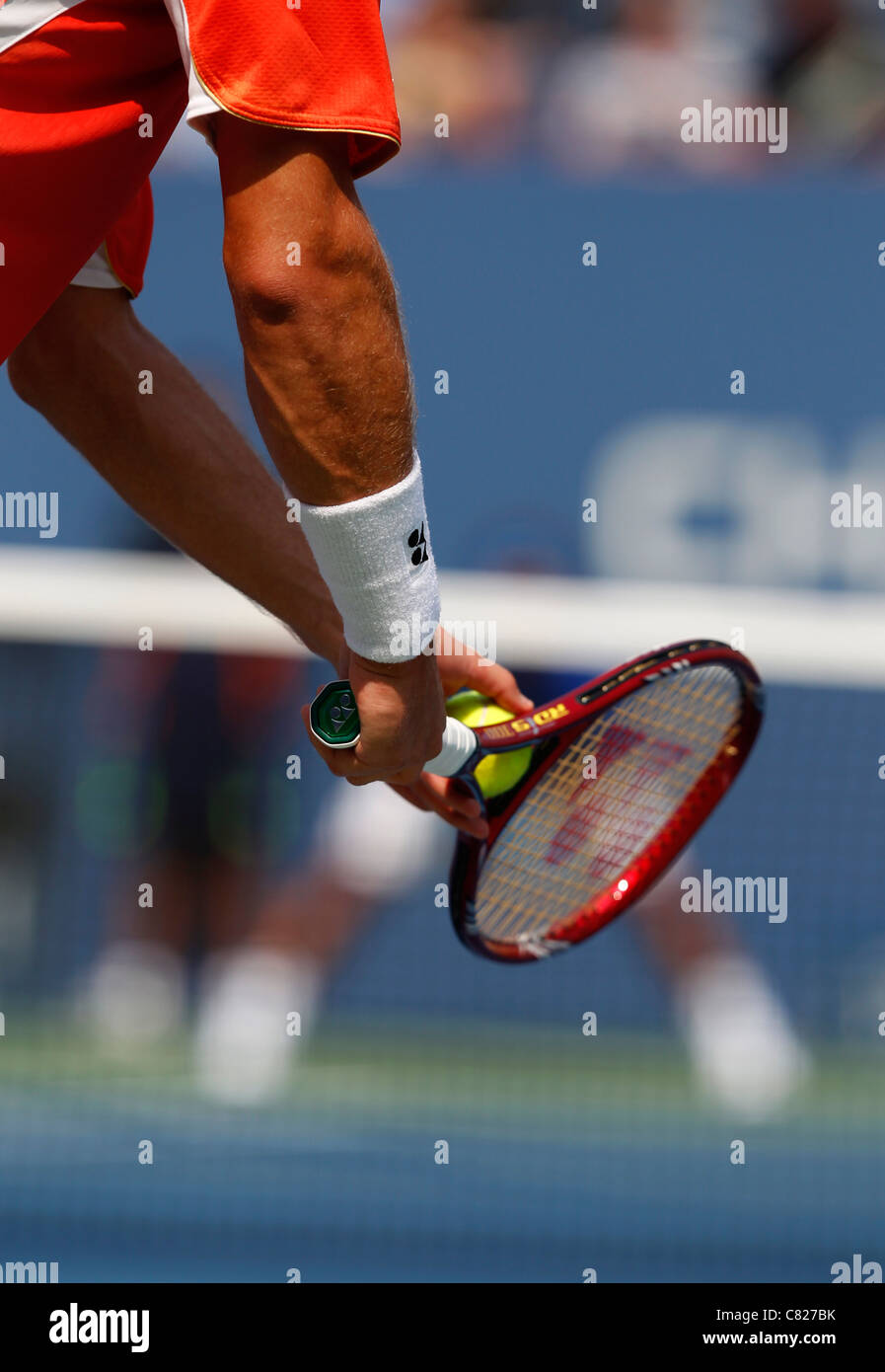 Tennis player about to serve at the U.S. Open 2011. Stock Photo