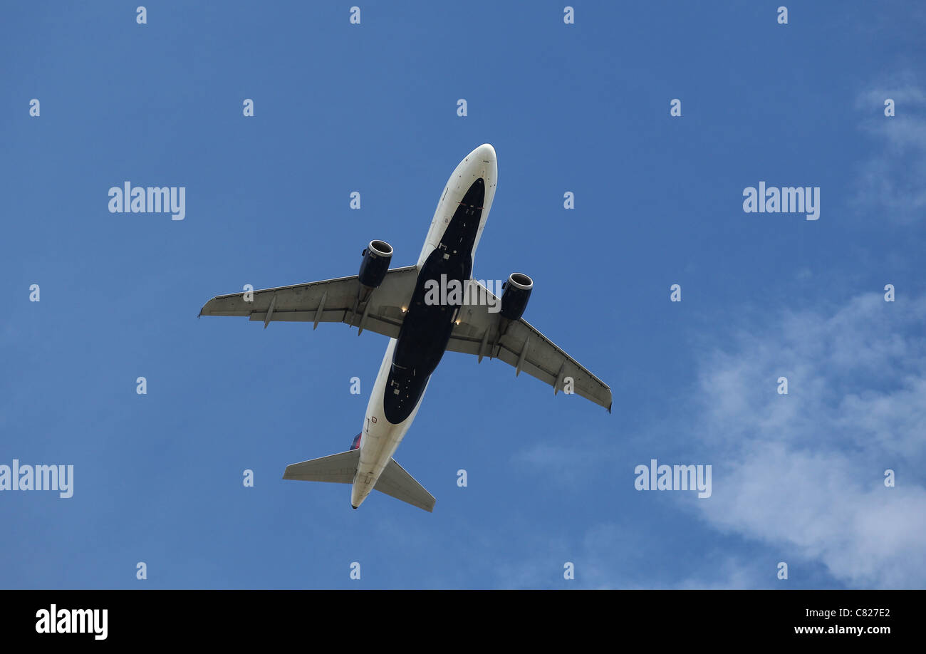 Passenger plane up in the air. Stock Photo