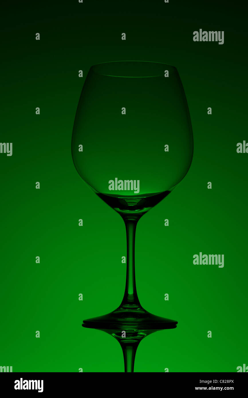 Red wine glass Pinot Noir, Burgundy or on green background