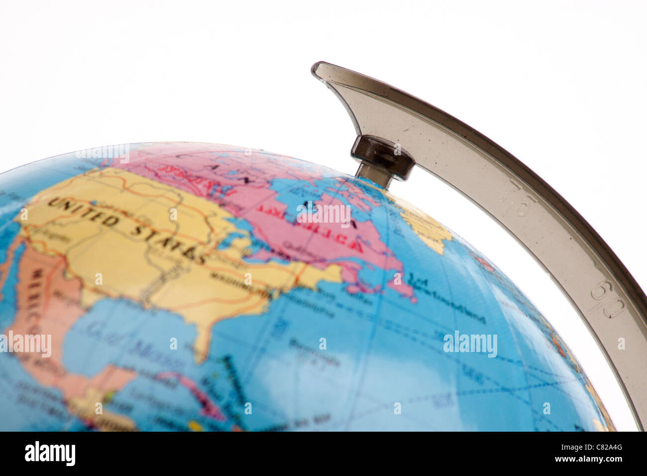 Close up of a globe against a white background Stock Photo - Alamy