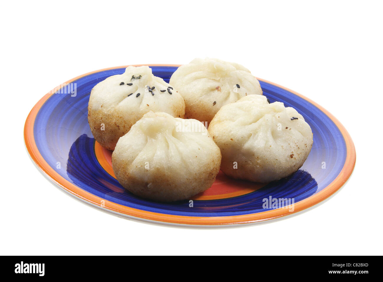Plate of Chinese Meat Dumplings Stock Photo