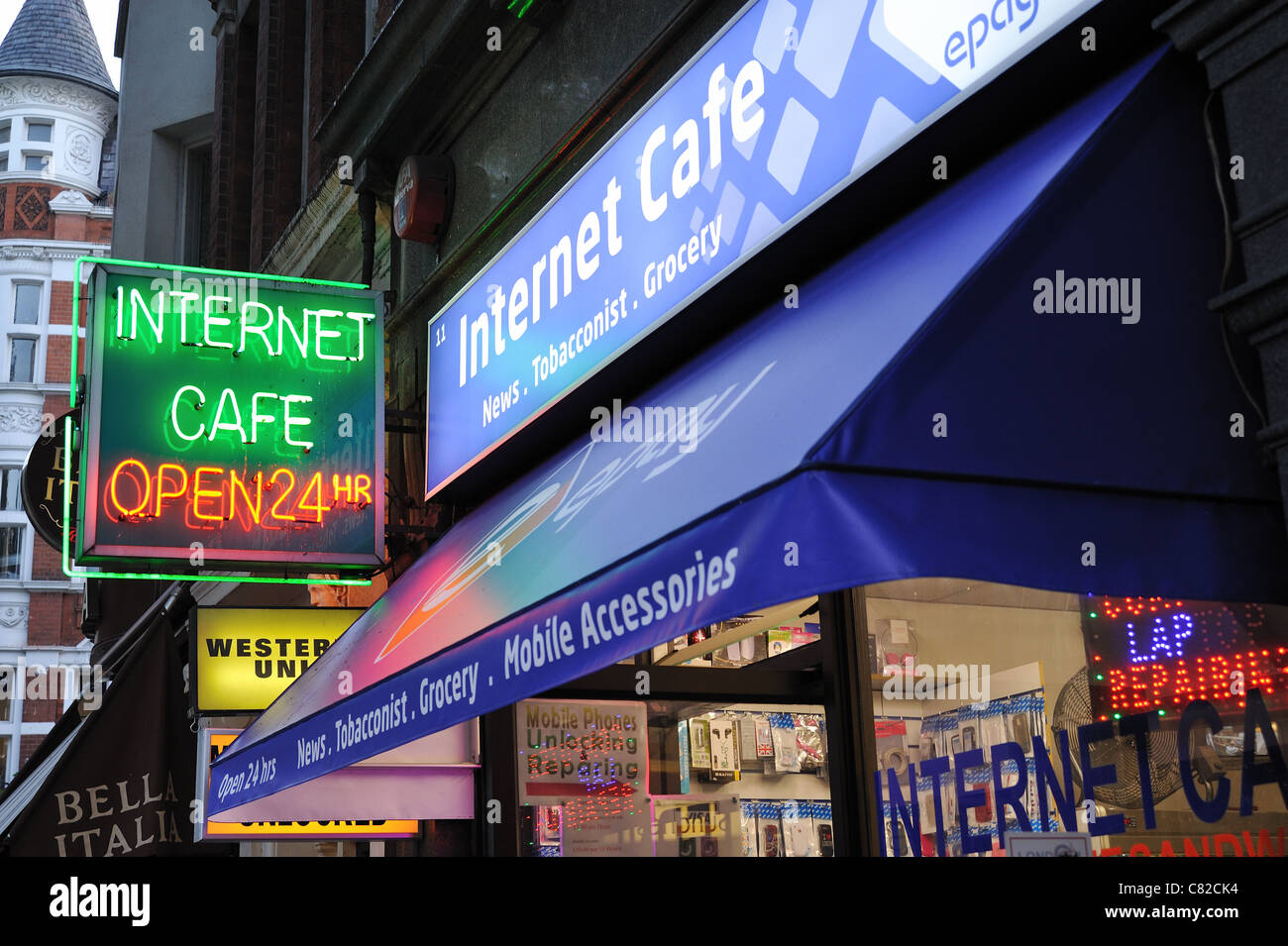 24 Hour hr Internet cafe sign Stock Photo