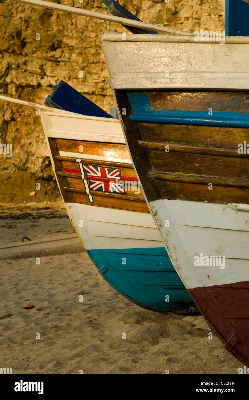 Bows of coble fishing boats with Unionjack flag Stock Photo Alamy
