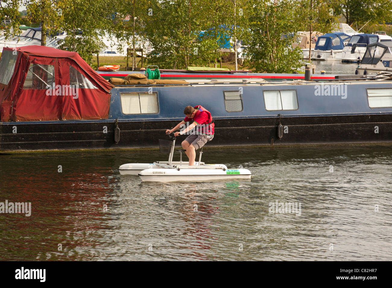 human powered catamaran boat on the River Great Ouse in Ely, UK Stock Photo