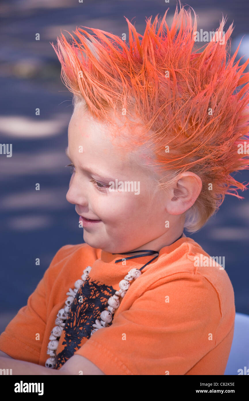 Orange Halloween hairdo in punk fashion, at the Art Block Party, Roswell Museum and Art Center, Roswell, New Mexico. Stock Photo