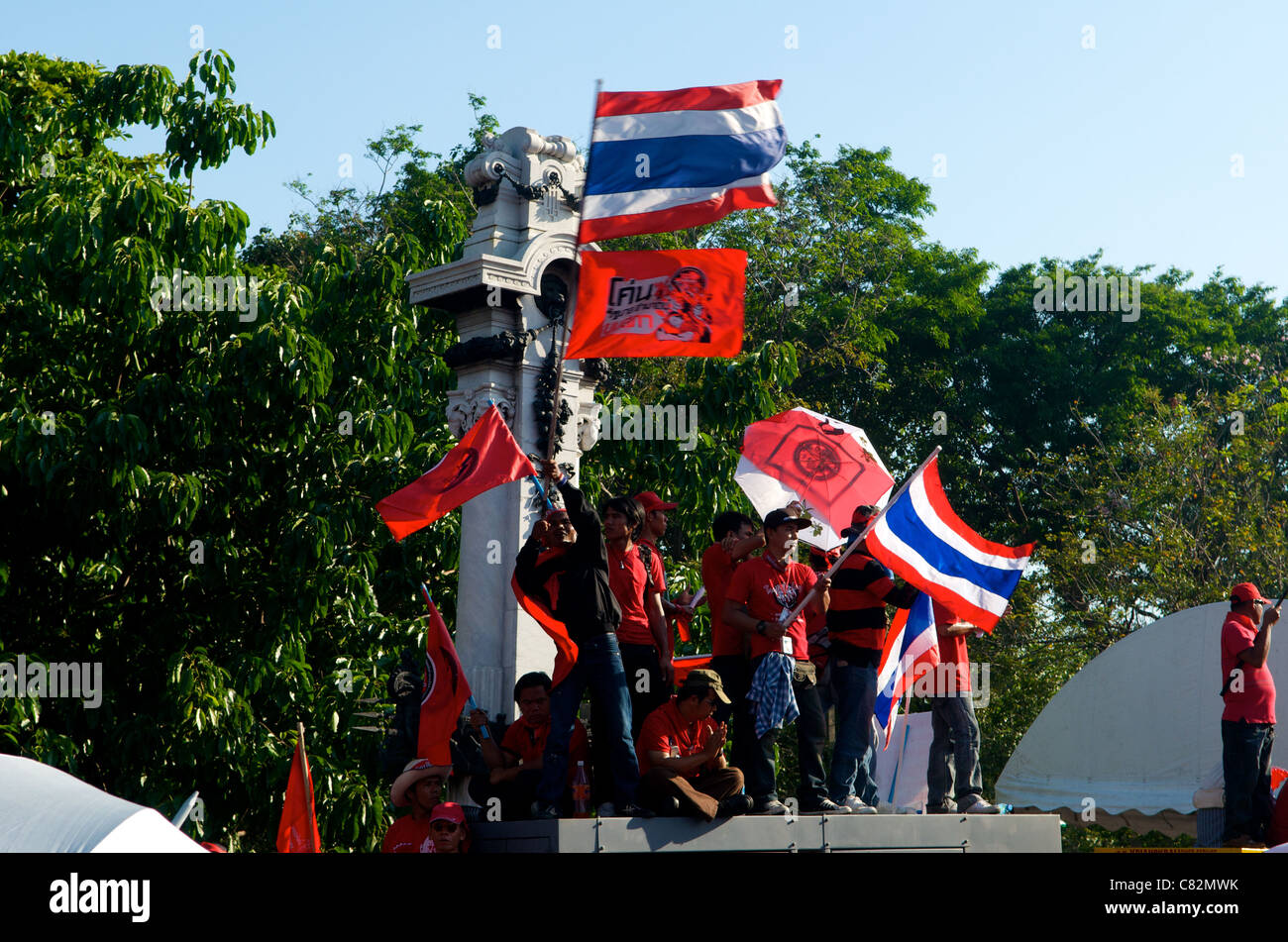 protesters wave flags, Red shirt protest, Phan Fa Bridge, Bangkok, Thailand. © Kraig Lieb Stock Photo