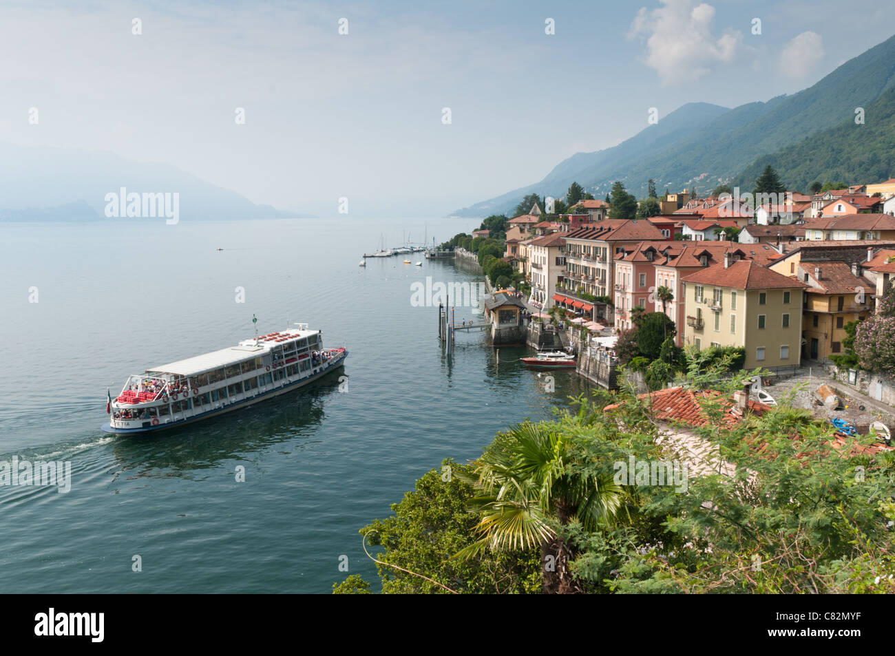 Passenger ferry approaching Cannero Riviera, Lake Maggiore, Italy. Stock Photo