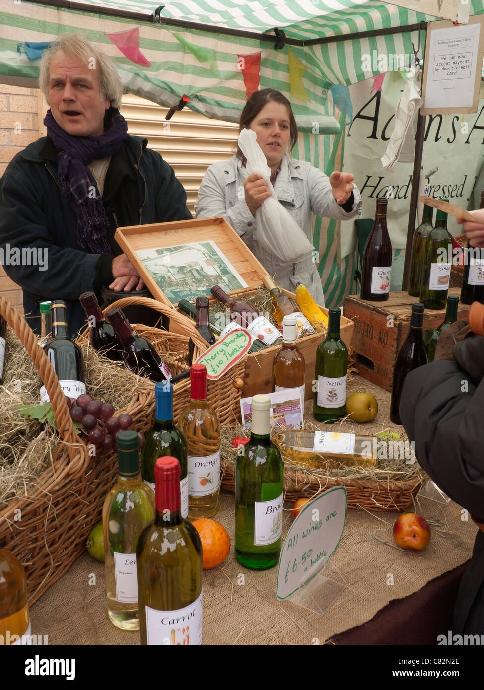 Wine makers from the Skinningrove Country Wine Co. at a farmer's market