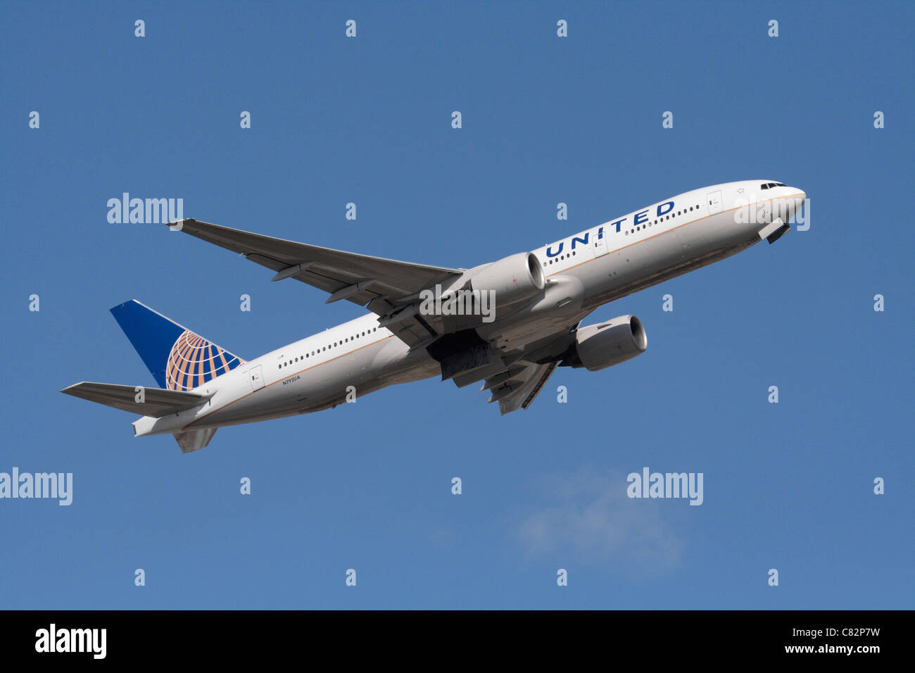 United Airlines Boeing 777-200ER long haul passenger jet plane on takeoff at the start of an intercontinental flight Stock Photo
