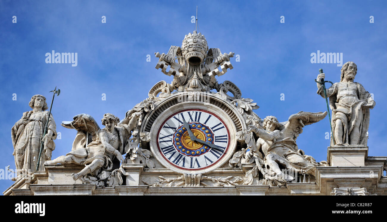 Clock adorning the facade of St Peter's Basilica, Vatican City, Rome ...