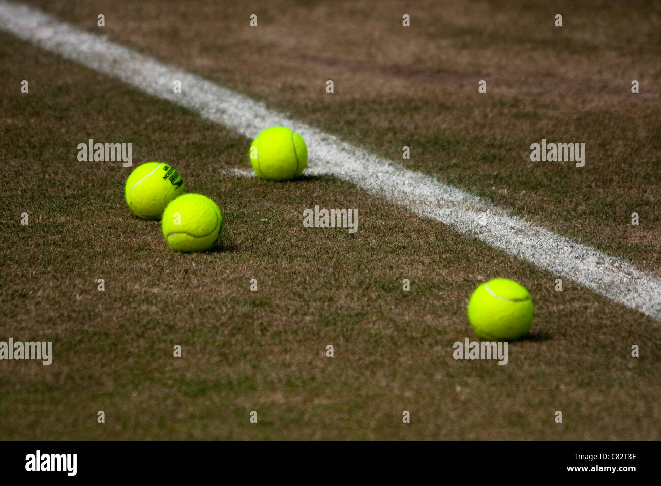 Wimbledon Tennis Balls on Court Stock Photo Alamy