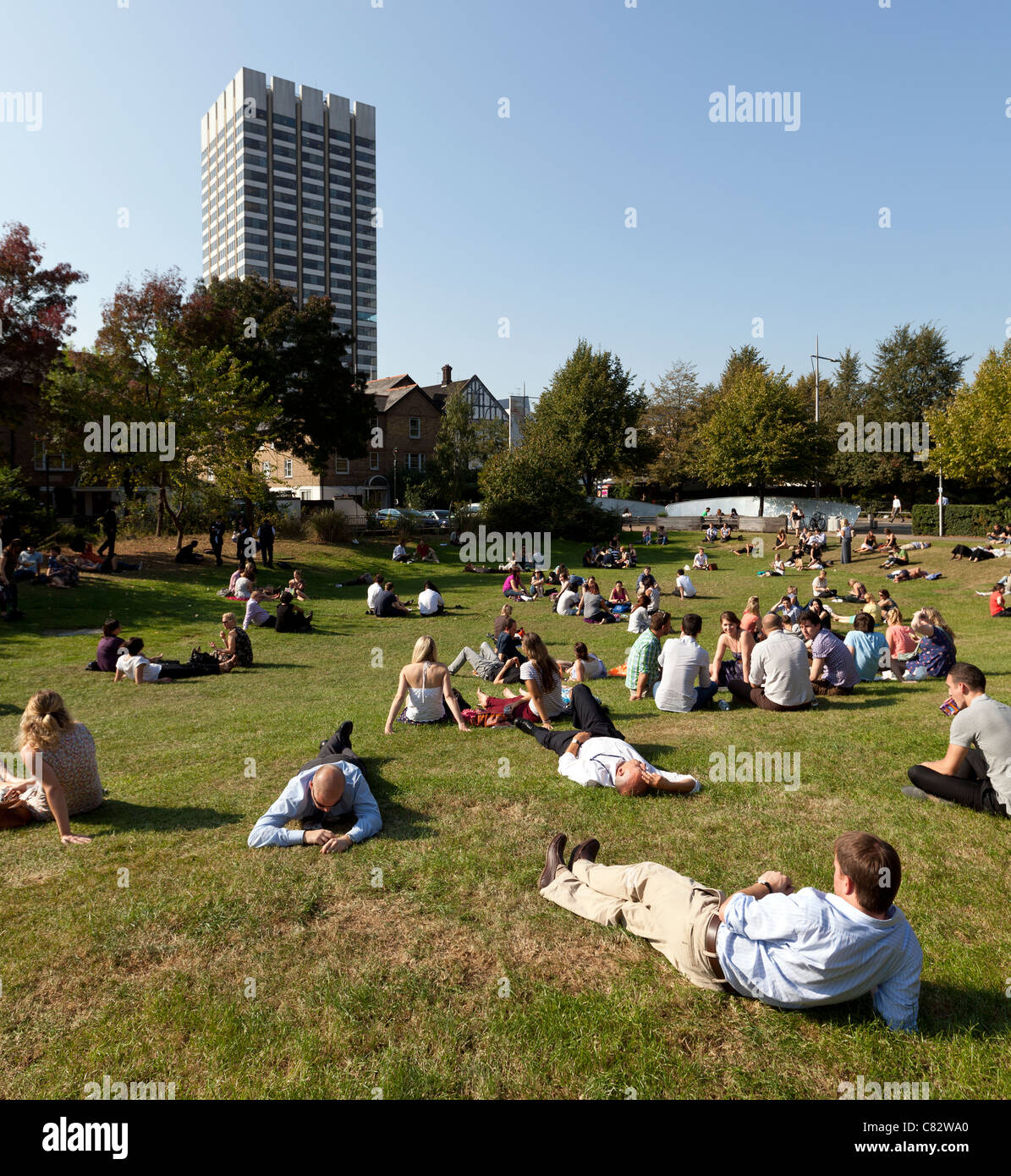 Bernie Inn England Office workers enjoy a lunchtime relaxing in the sun, Bernie Spain ...