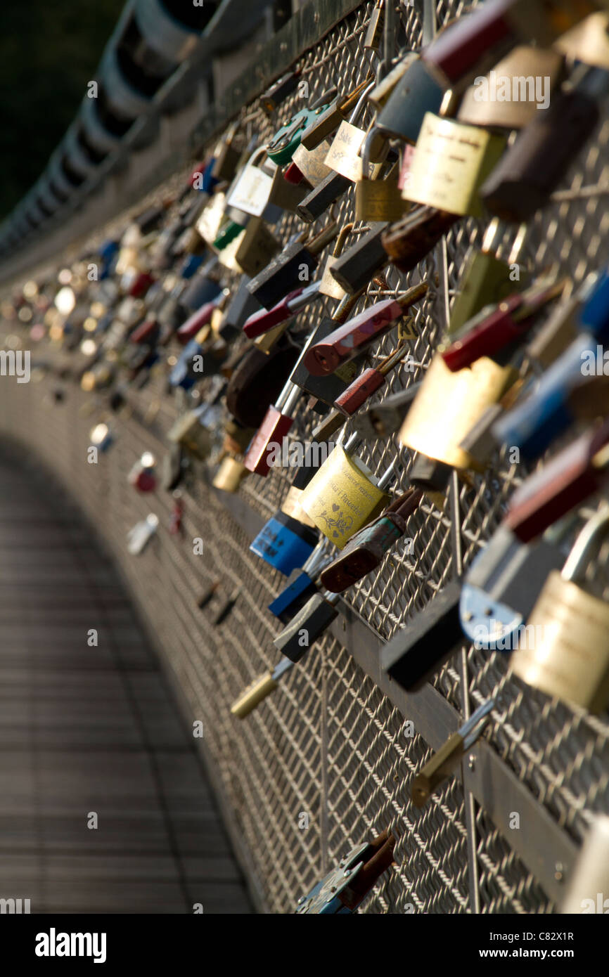 Love padlocks on the Bernatek bridge in Krakow. Stock Photo