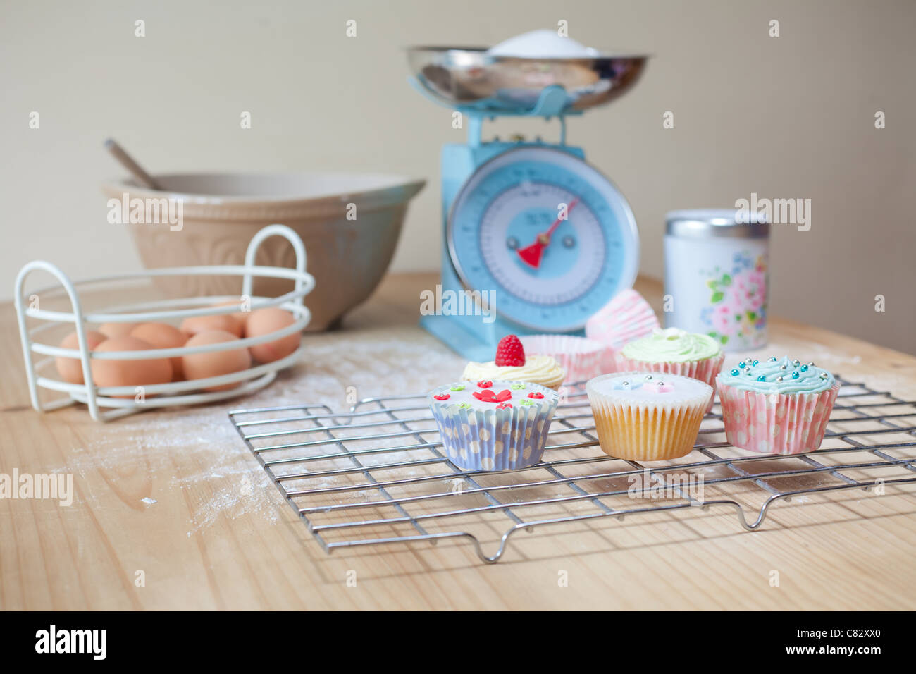 Baking equipment and fairy cakes Stock Photo