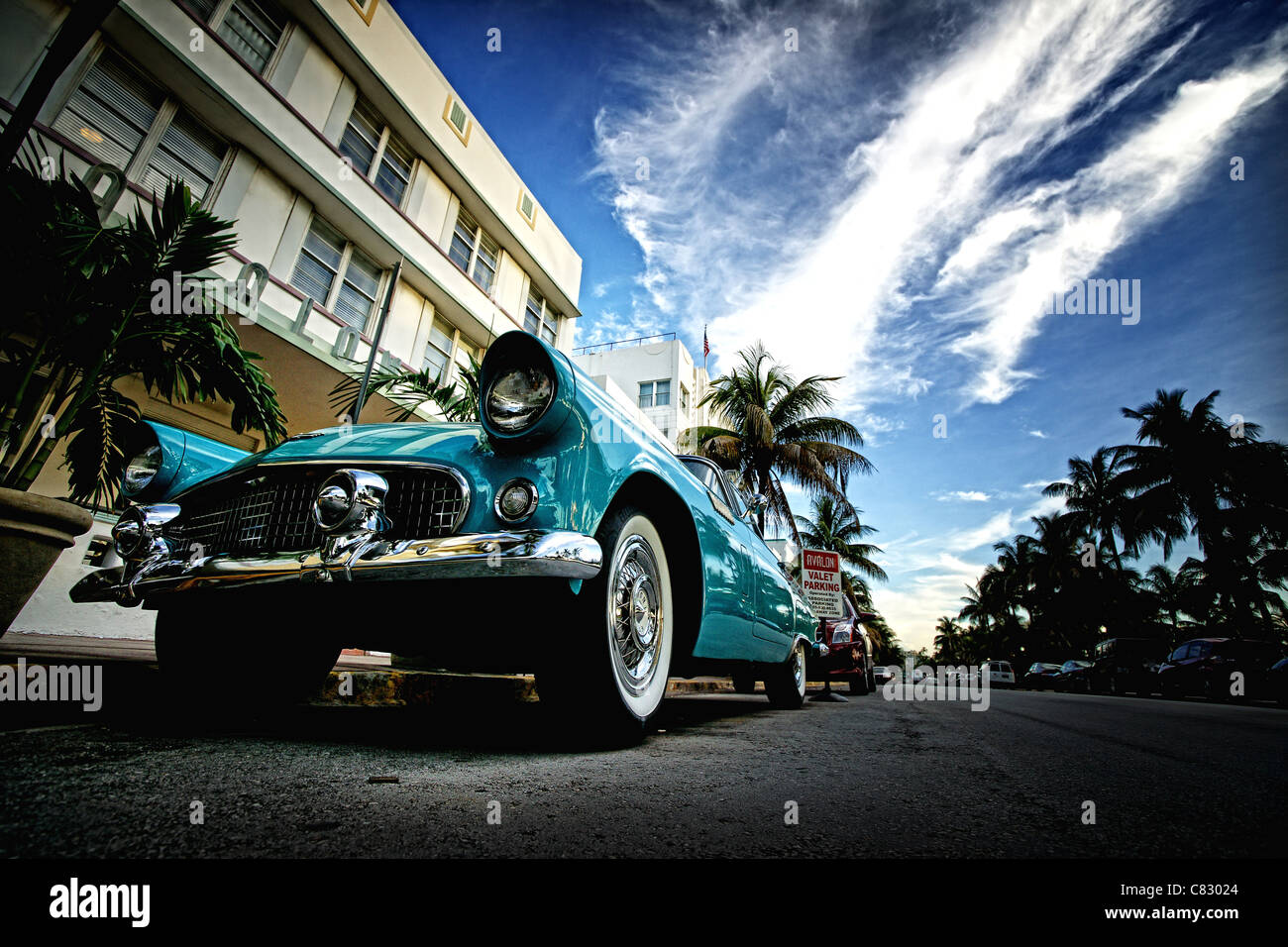 low angle photo of classic car on ocean drive, miami beach, florida