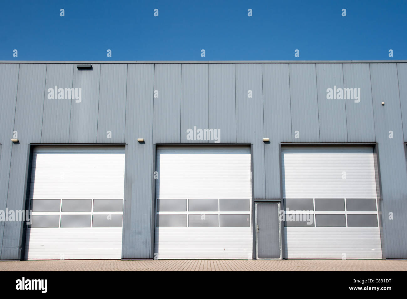 Industrial unit with roller shutter doors Stock Photo