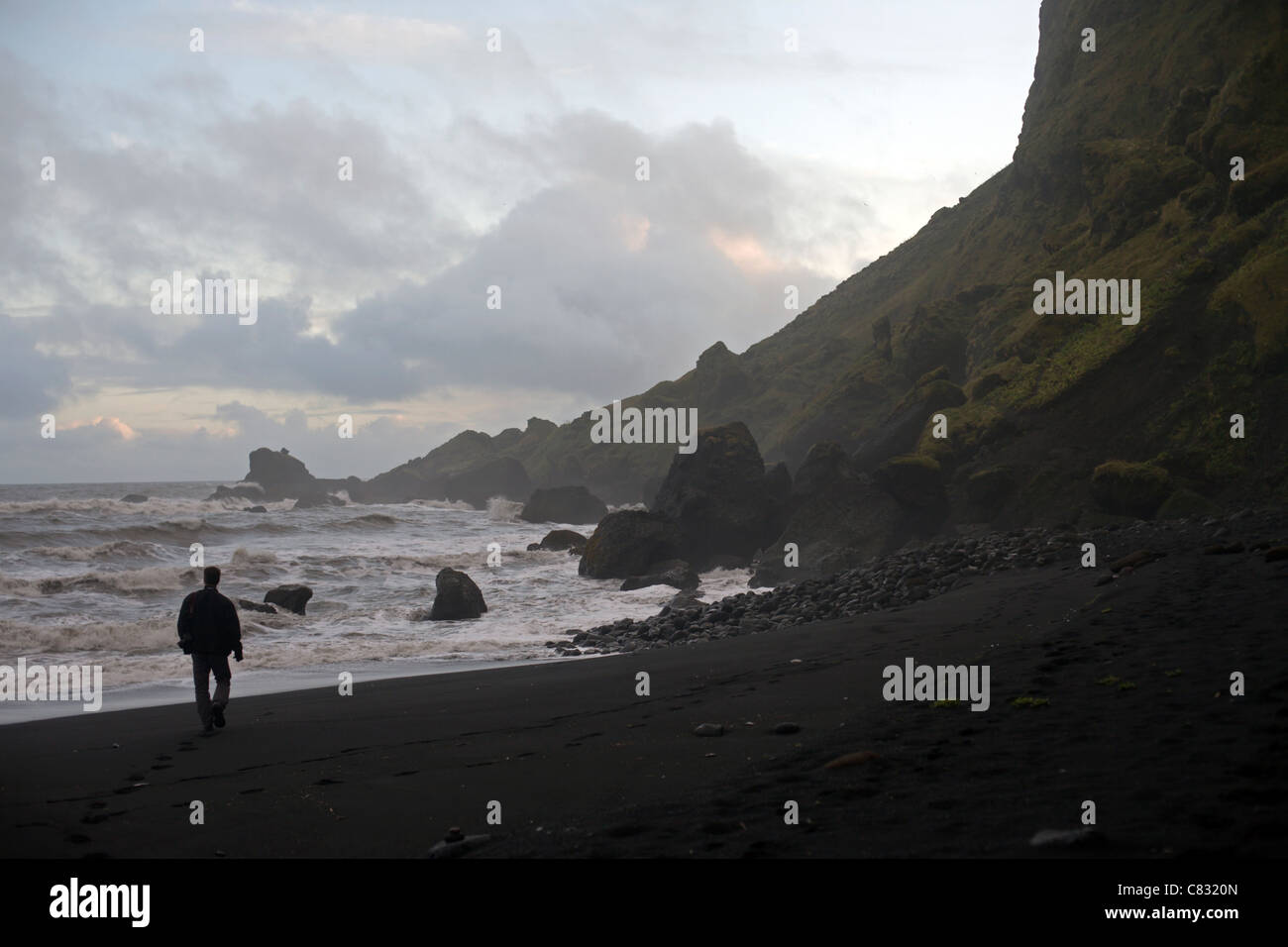 Solitary man on beach hi-res stock photography and images - Alamy