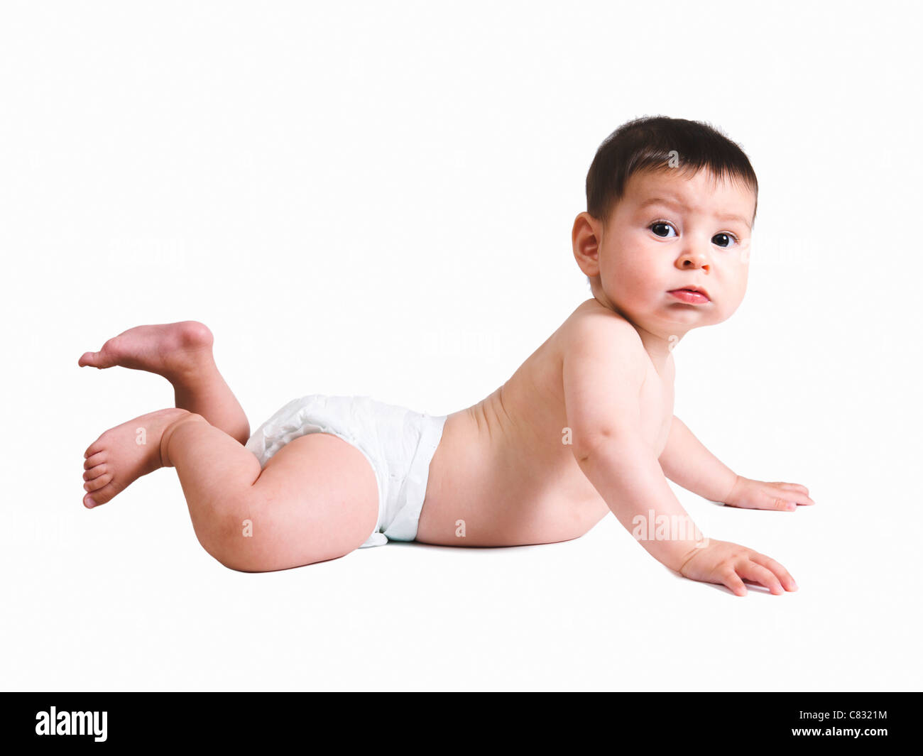 5 month baby boy on stomach lifting chest Stock Photo
