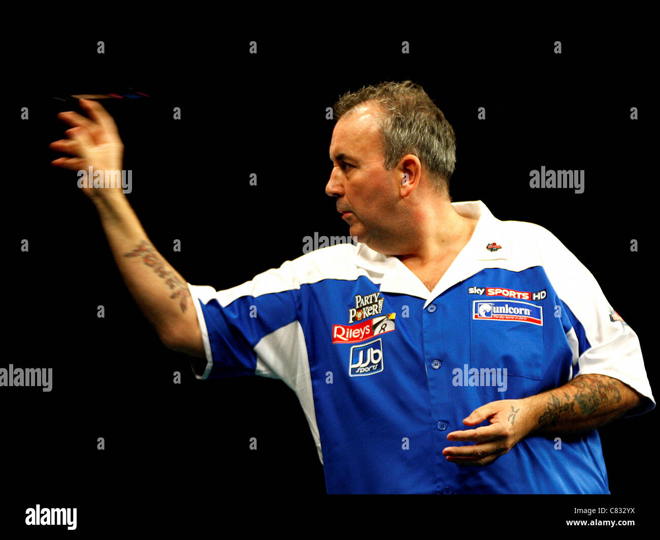 Dublin, Republic of Ireland. Phil Taylor in action against Brendan Dolan, during the final of the PDC World Grand Prix Stock Photo