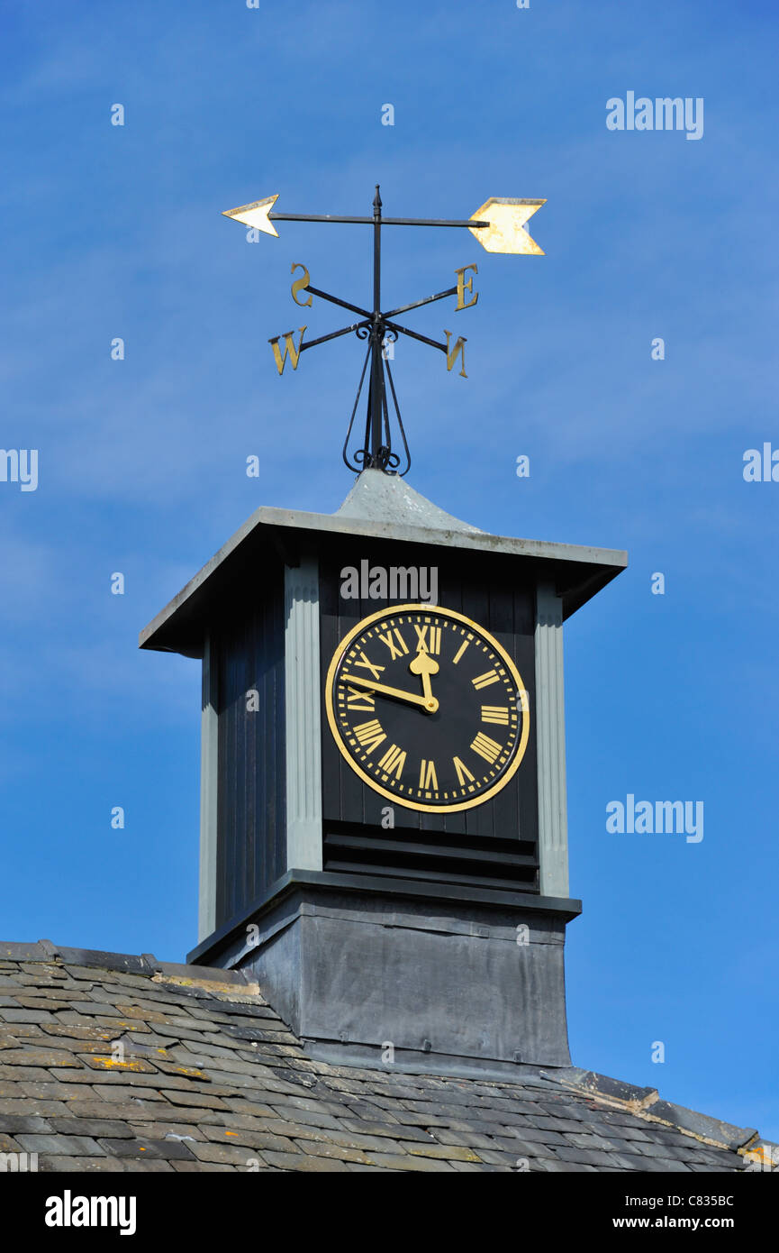 Clock tower with weathervane. Sanders Farm, Borwick, Lancashire, England, United Kingdom, Europe
