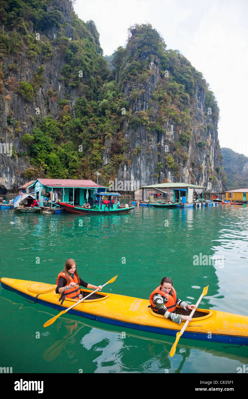 Vietnam, Halong Bay, Tourists Kayaking Stock Photo - Alamy