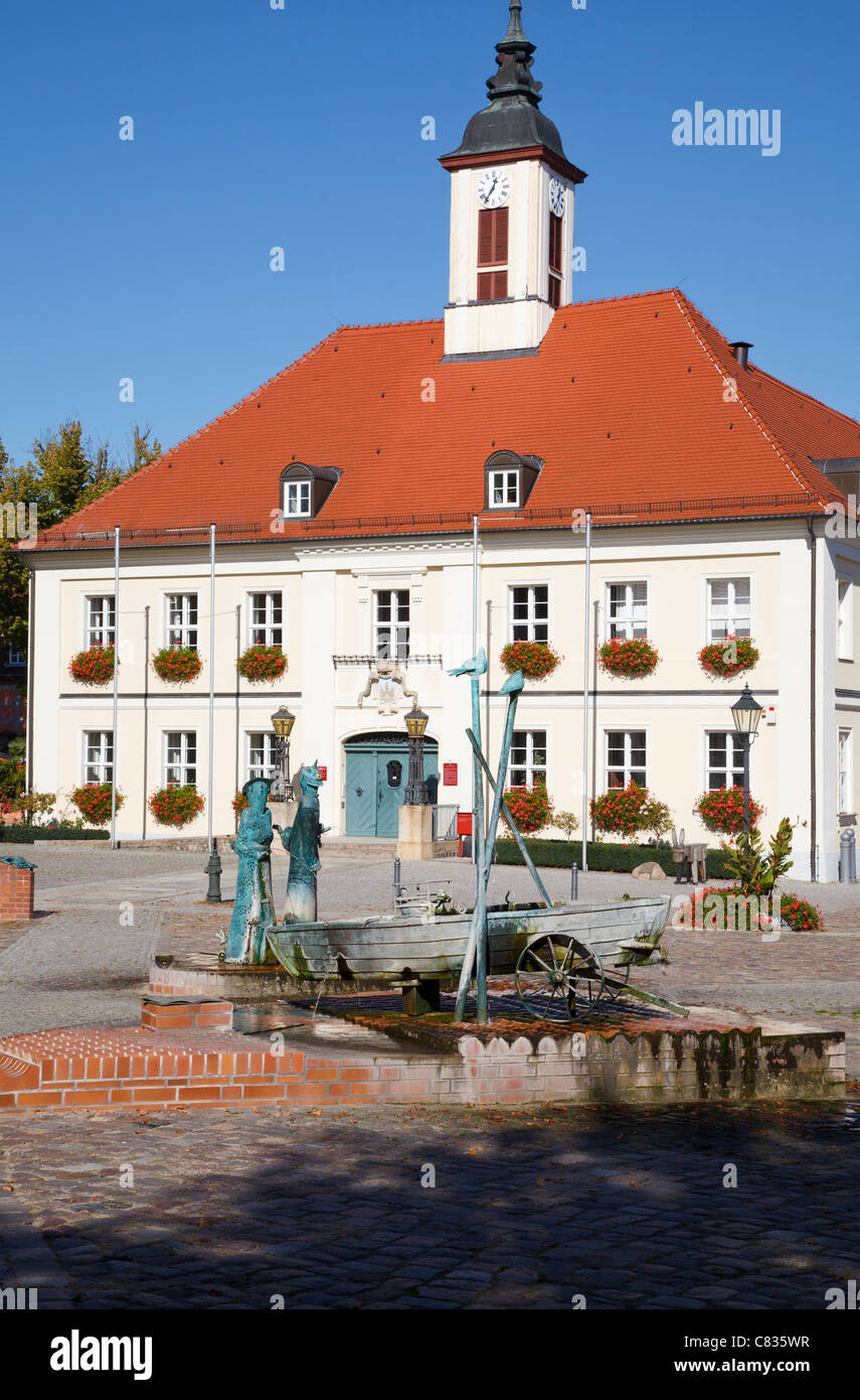 Rathaus on the Market Place with fountain and sculptures by Christian Uhlig, Angermuende, Brandenburg, Germany Stock Photo