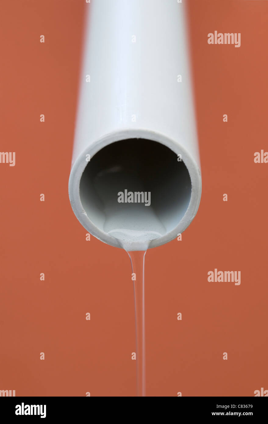 water pouring from plastic pipe Stock Photo Alamy