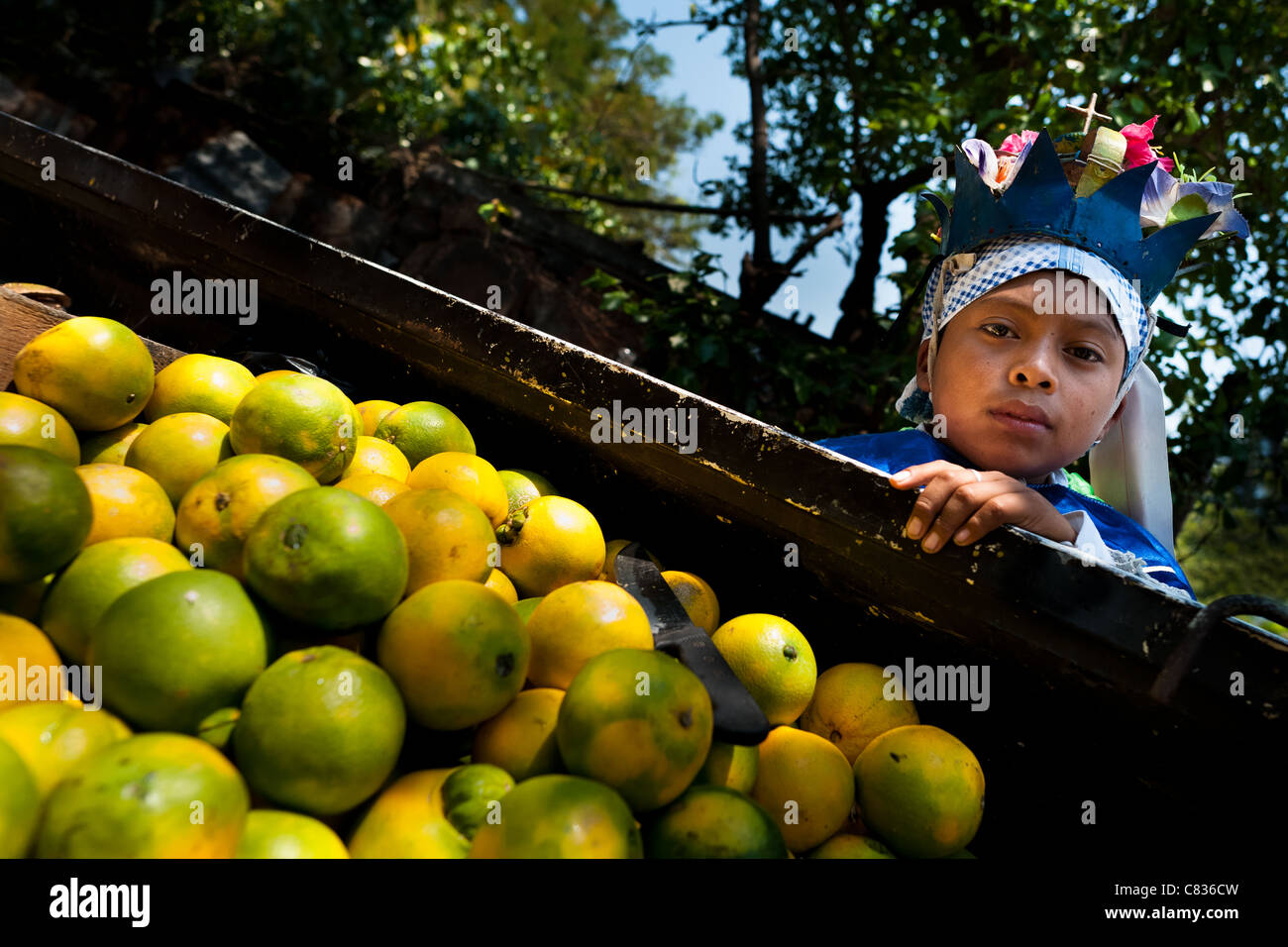 A Salvadoran boy poses for a picture during the Flower & Palm Festival in Panchimalco, El Salvador. Stock Photo