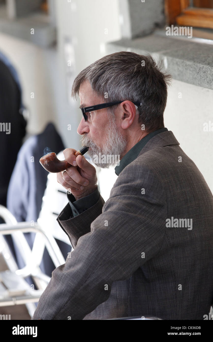 man smoking pipe Stock Photo