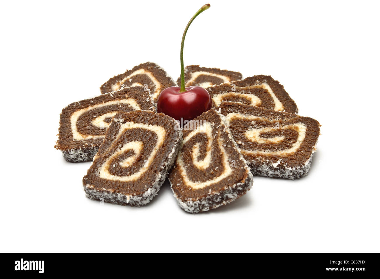 Coco roll with cherry isolated on white Stock Photo - Alamy