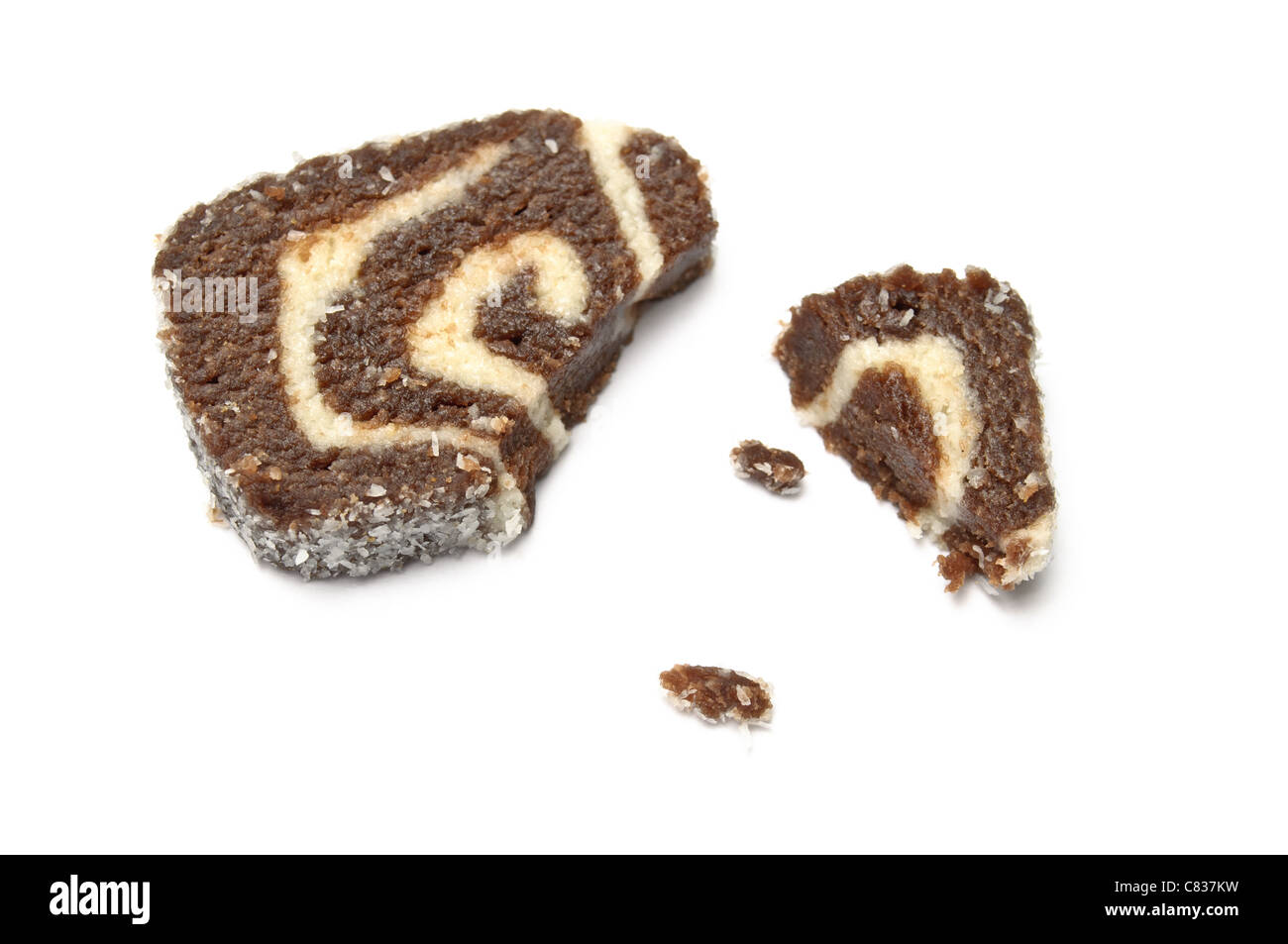 Coco roll slice with crumbs overhead view isolated on white Stock Photo ...