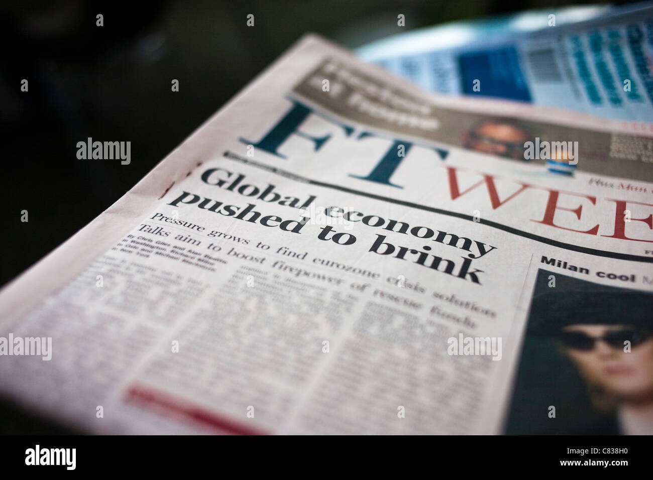 Austerity hits - Financial Times, Financial Crisis headlines: Global Economy Pushed to Brink -headlines Stock Photo