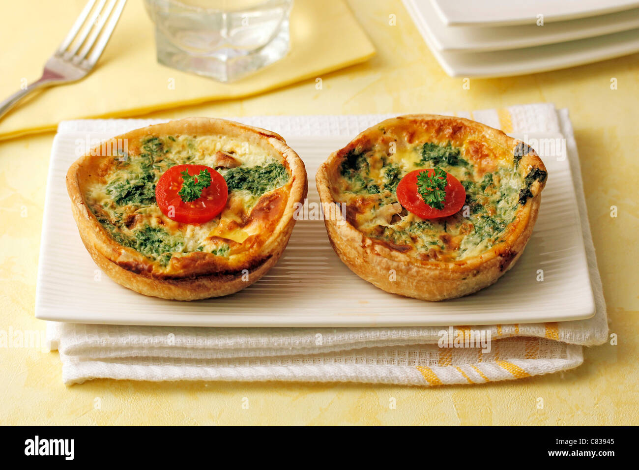 Mini quiches with cheese and spinach. Recipe available Stock Photo Alamy