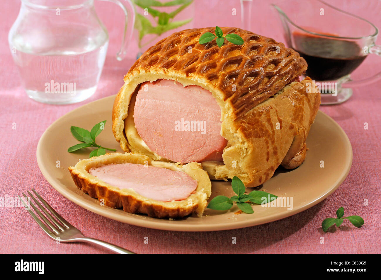 Puff pastry with ham Wellington . Recipe available Stock Photo Alamy