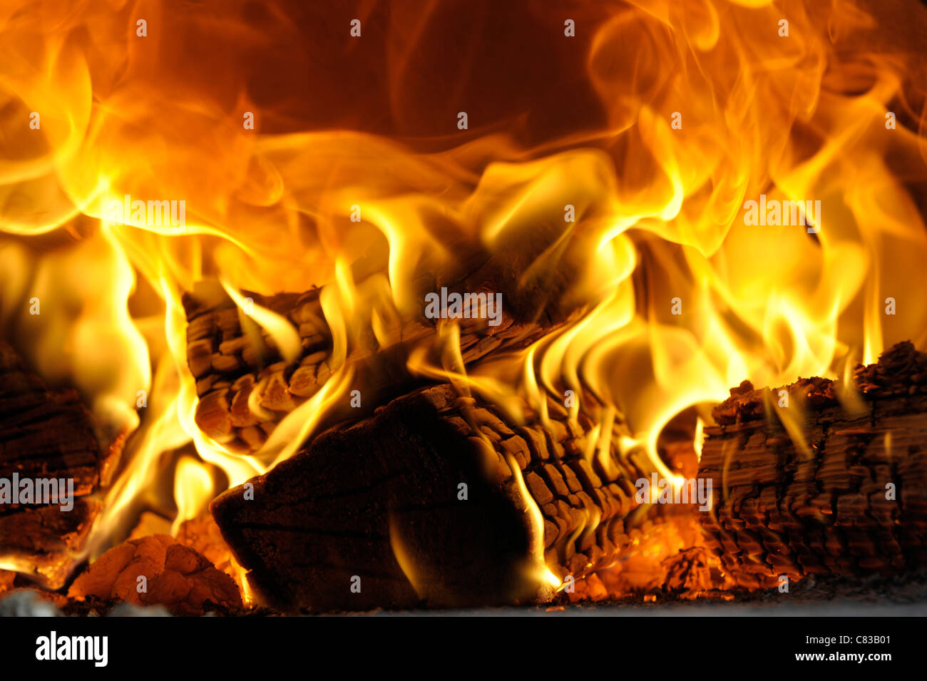 Log fire wood burning flames hires stock photography and images Alamy