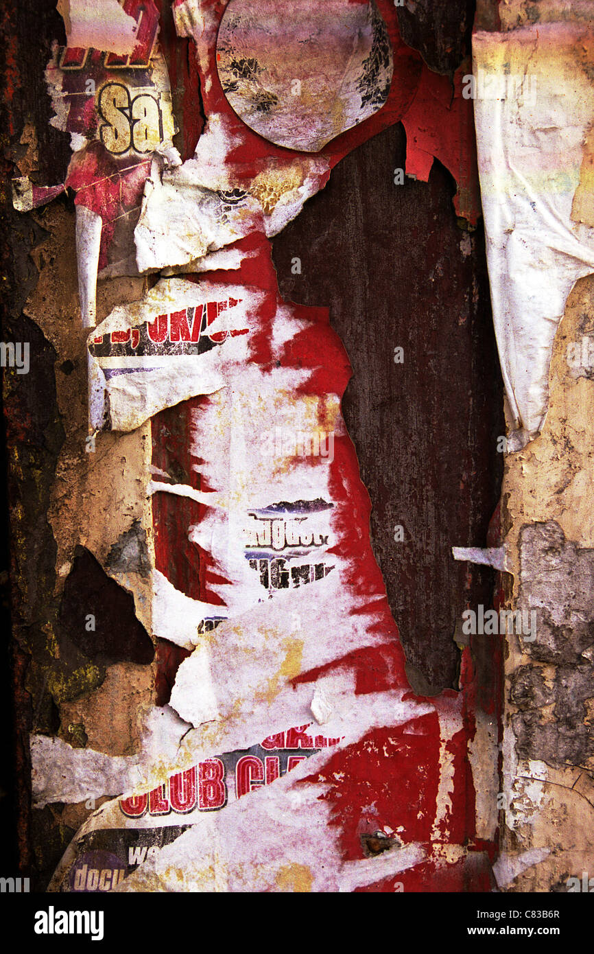 Billboard with old torn paper posters Stock Photo