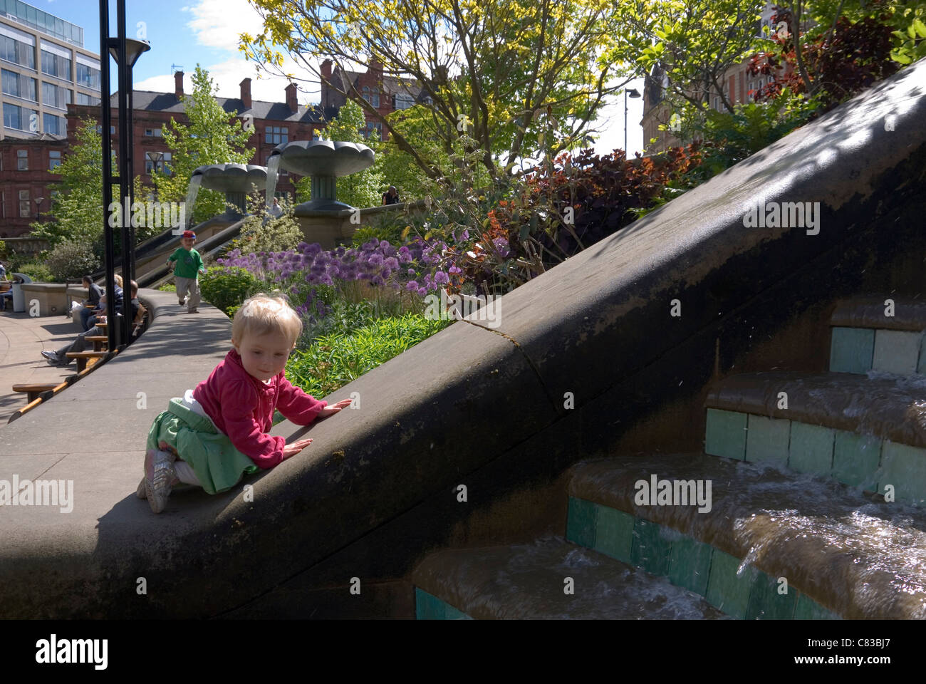 Little Girl Watching Water Fall Steps Of Peace Gardens Water Feature 