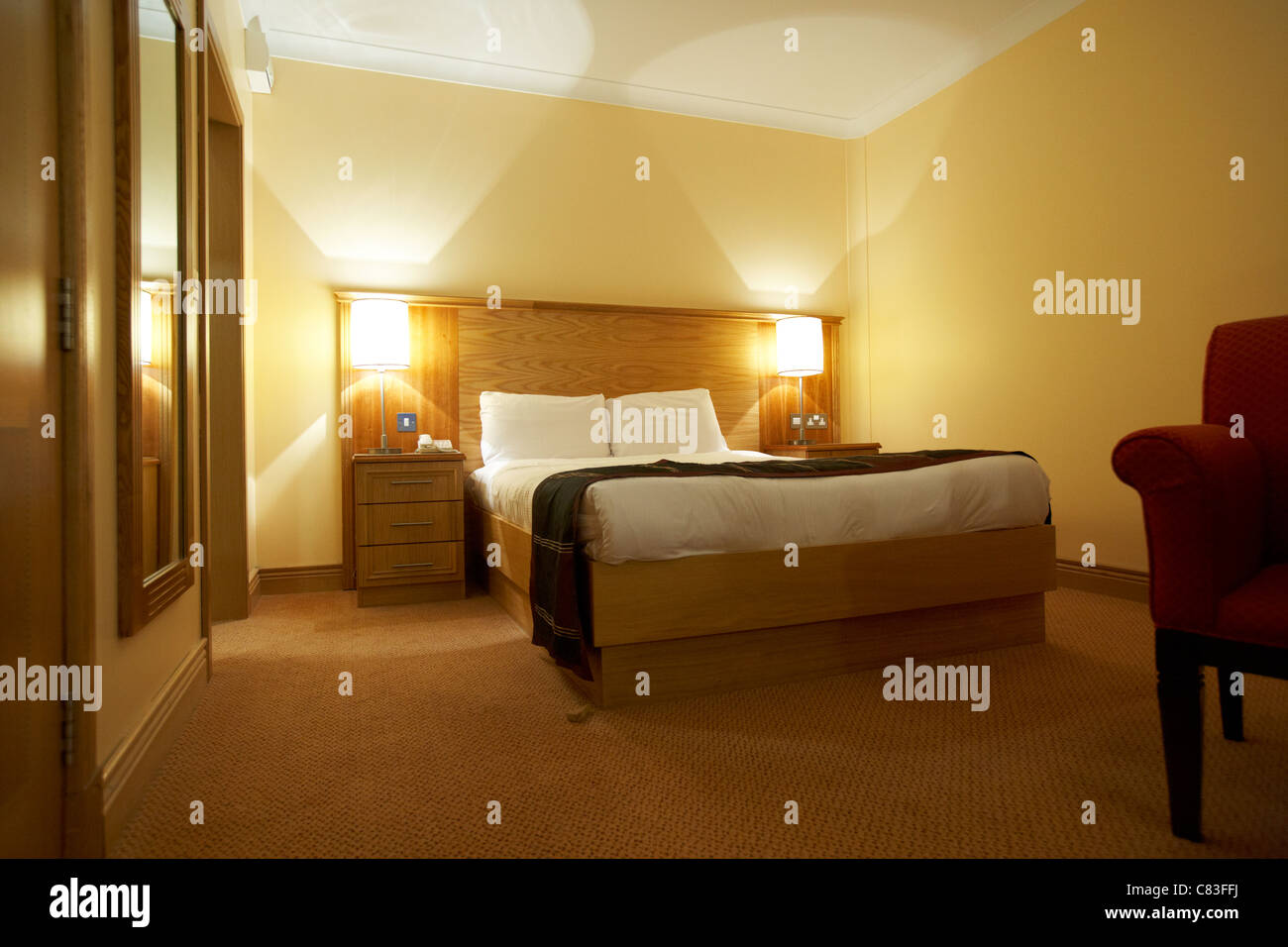 interior of a 4 star hotel bedroom with double bed Stock Photo - Alamy