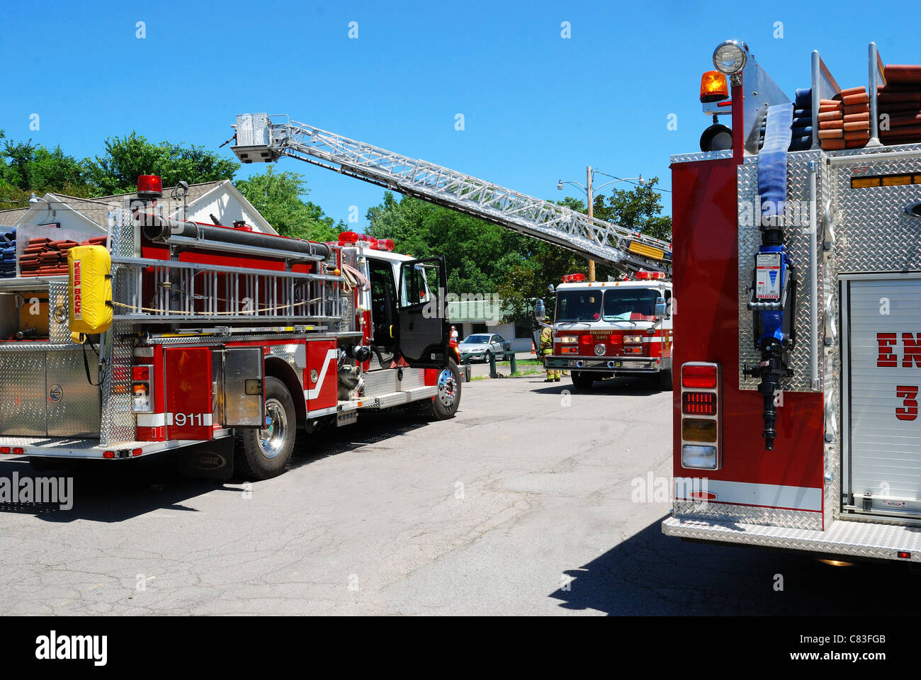 Fire engines respond to possible fire in food store. Stock Photo