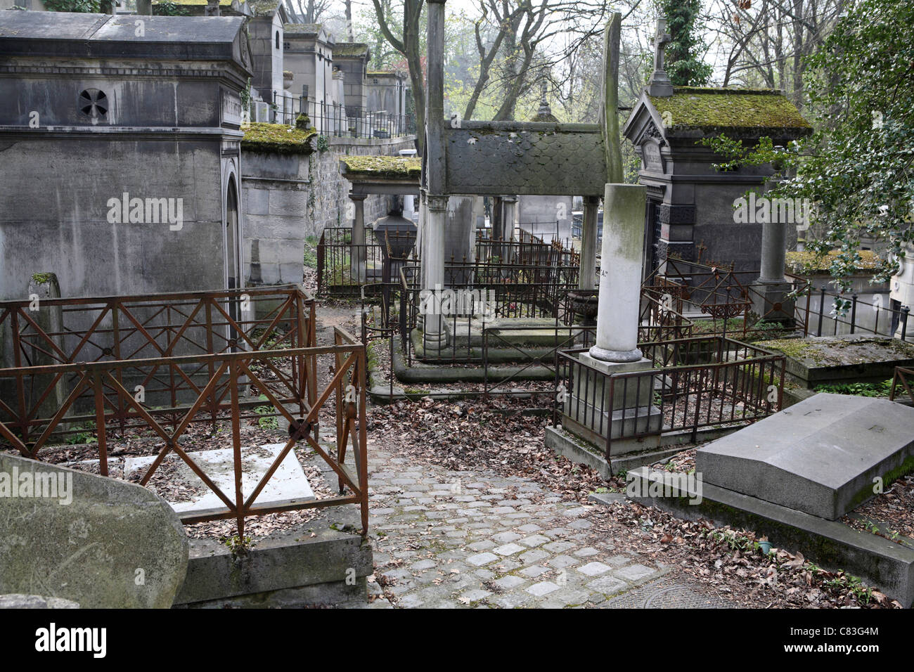 Pere Lachaise Cemetery in Paris, showing path and various tombs. Stock Photo