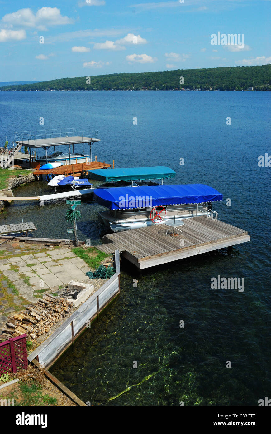 Docks and boats at cottages on Lake Keuka, Finger Lakes NY Stock Photo