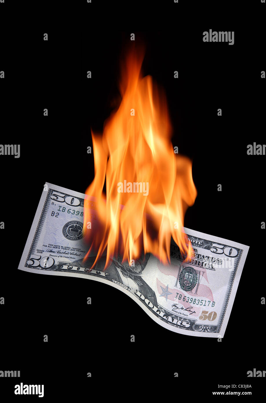 Burning 50 Dollar note. Stock Photo