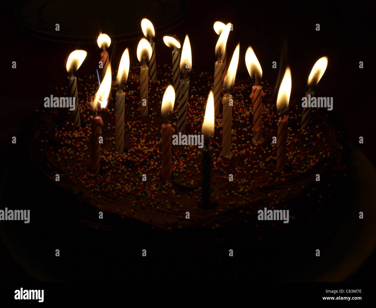 A chocolate cake with candles Stock Photo - Alamy