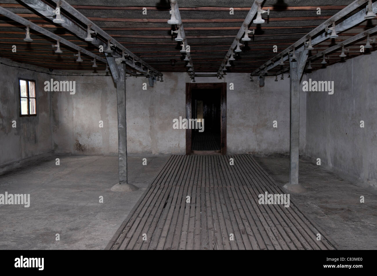 Showering facility in the delousing compound for newly arrived inmates, Majdanek concentration camp, Lublin, Poland Stock Photo