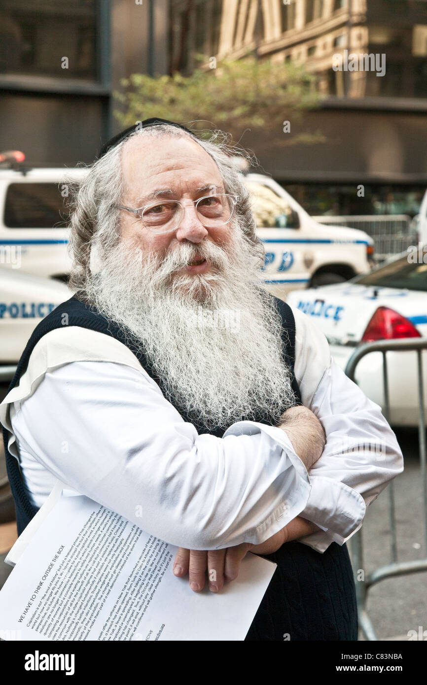 kindly-bearded-orthodox-jewish-elder-holding-protest-literature-to-C83NBA.jpg
