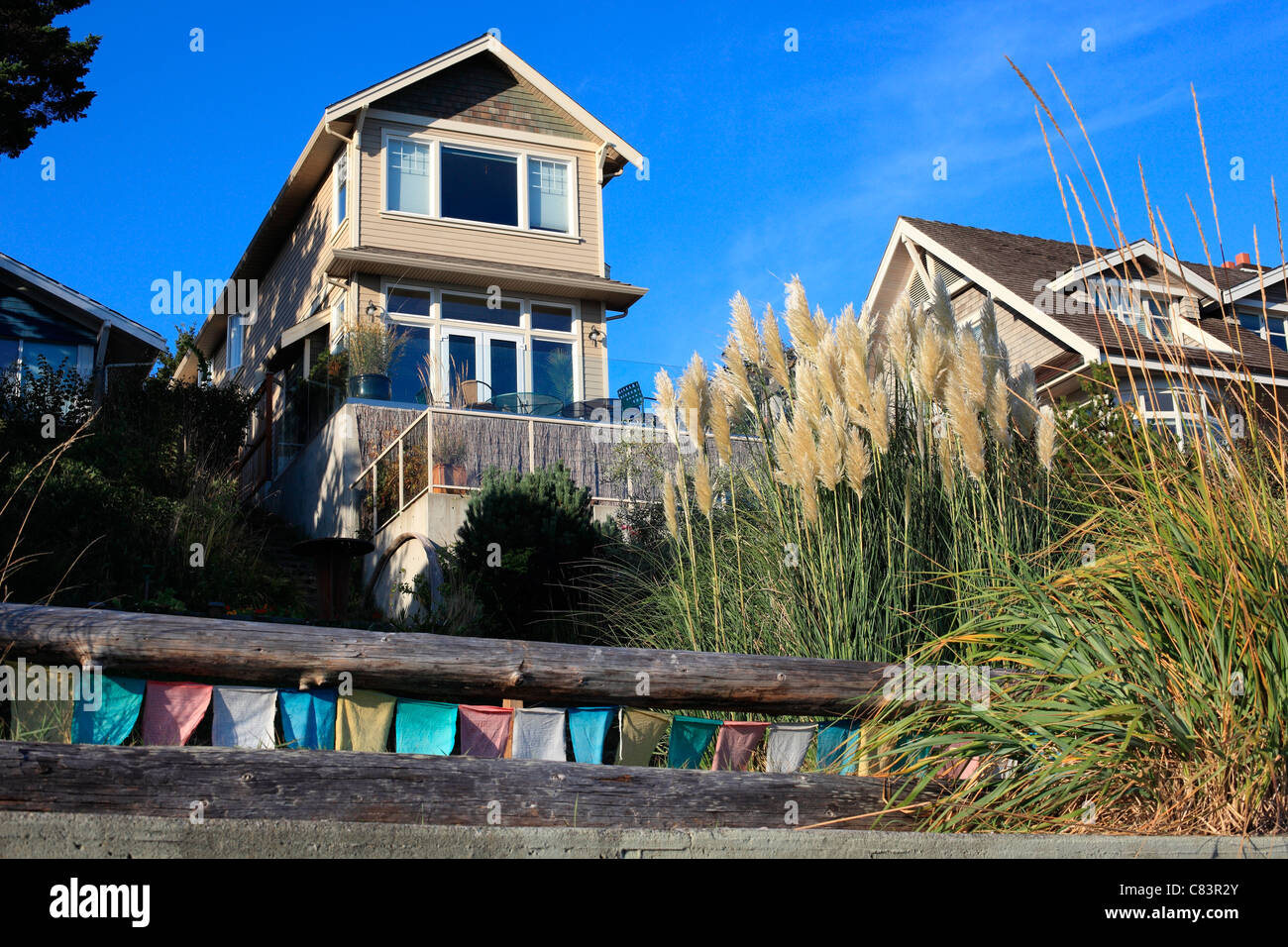 House with prayer flags in front Stock Photo