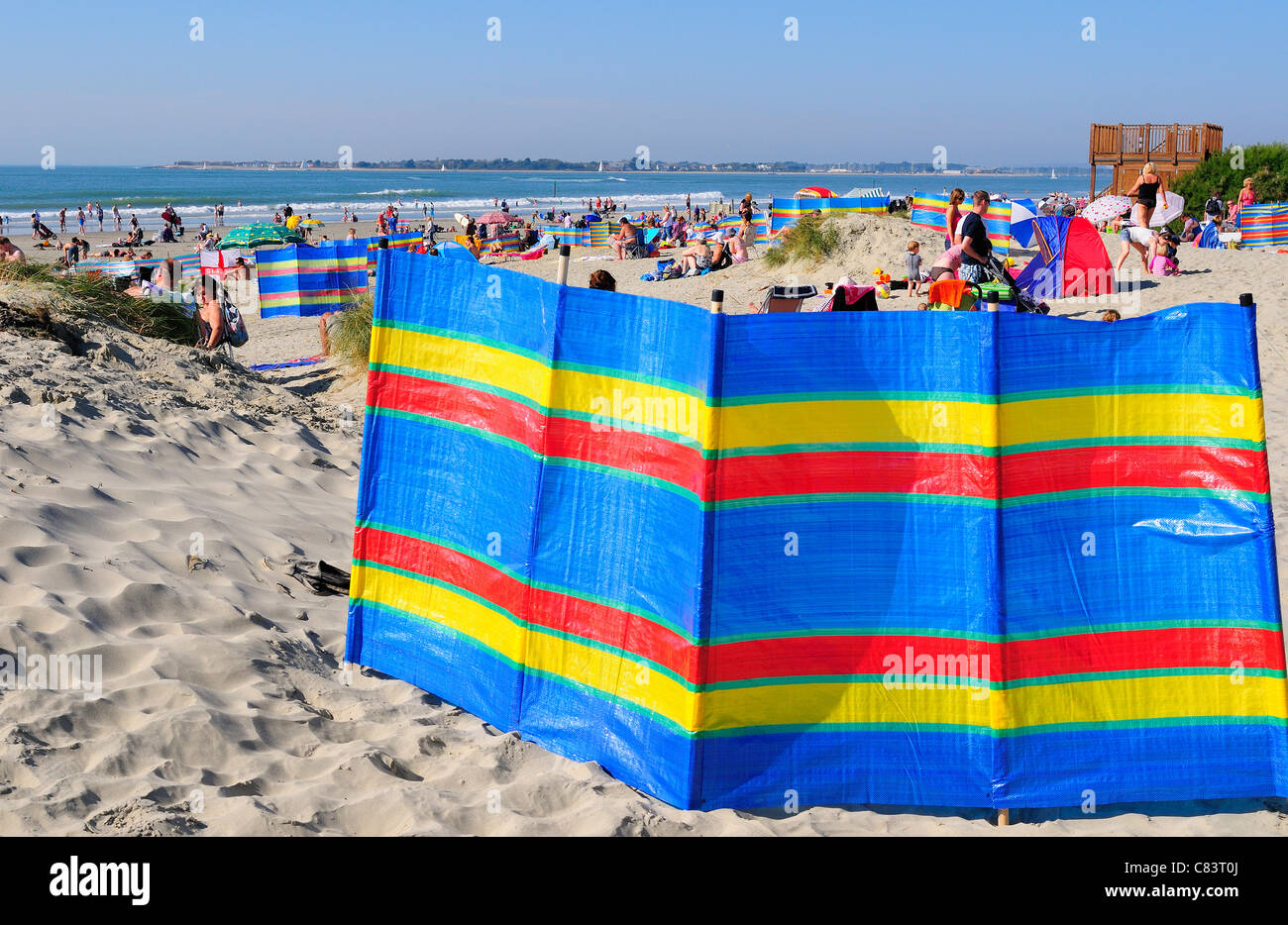 Mature couple sunbathing on beach hi-res stock photography and images ...