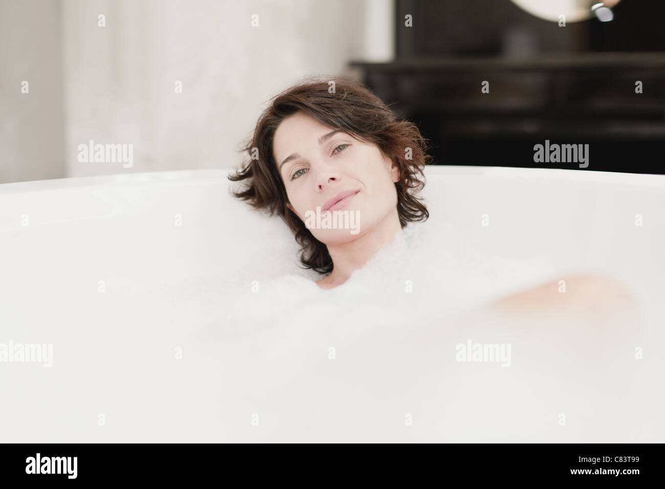 Young Woman Take Bubble Bath. Stock Photo, Picture and Royalty Free Image.  Image 12341170.